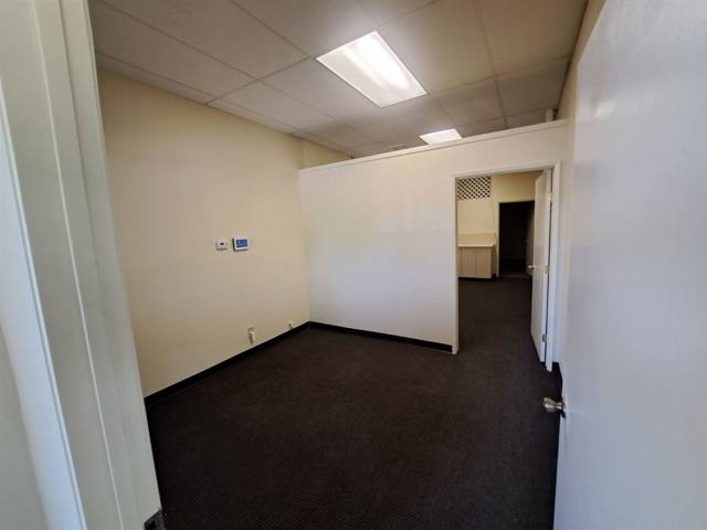 Unit 116 — interior (~1,158 SF storefront)