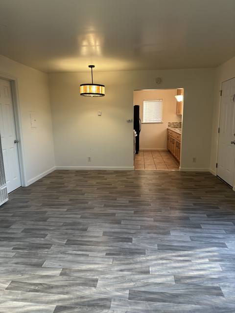 Updated one-bedroom: dining area opening to the kitchen