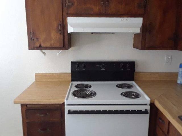 Kitchen range and cabinets
